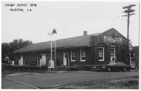 brick train depot in black and white